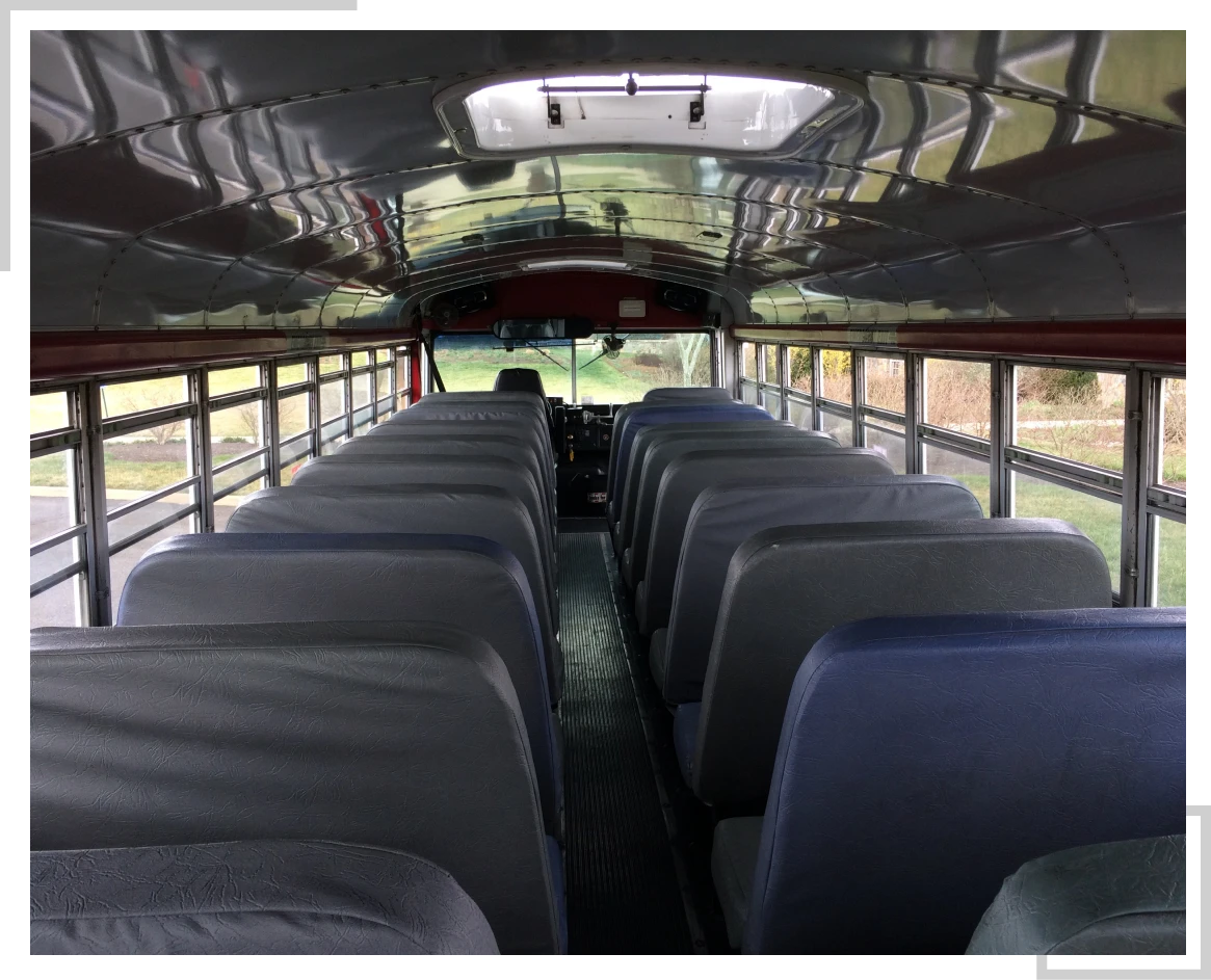 School bus seats lined up neatly.
