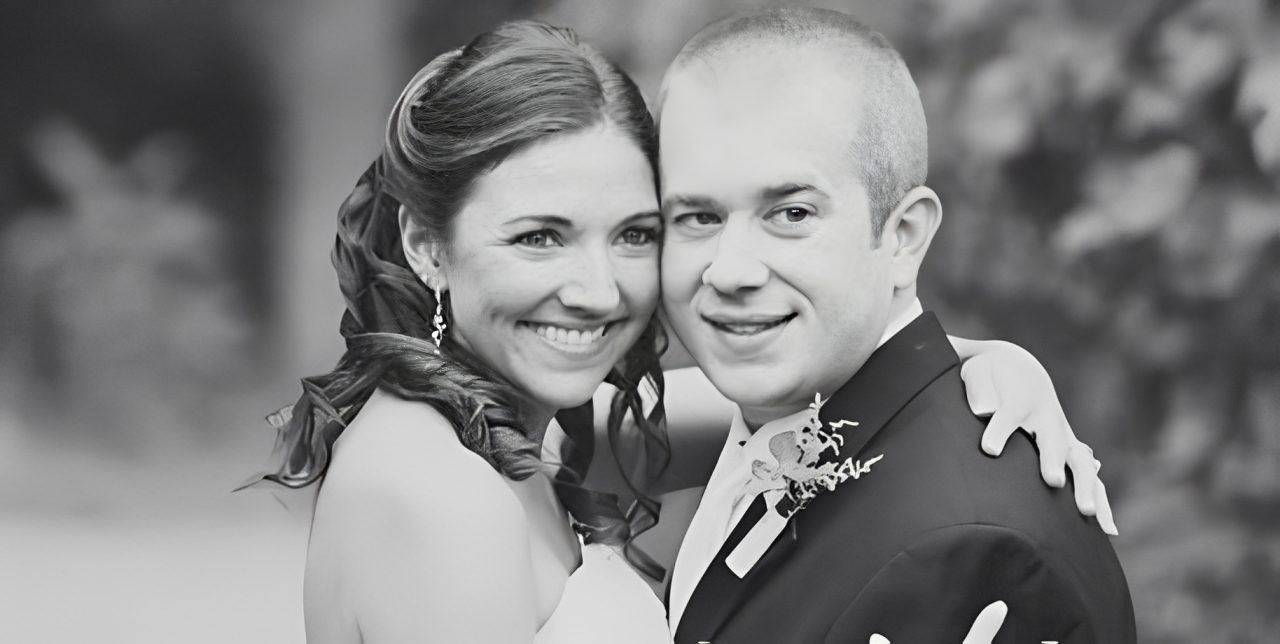Joyful newlyweds in black and white