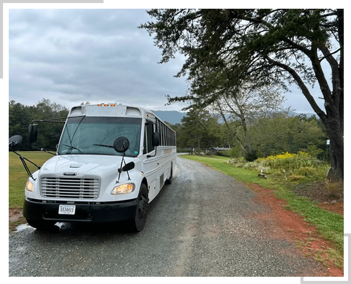 Scenic countryside with a parked bus