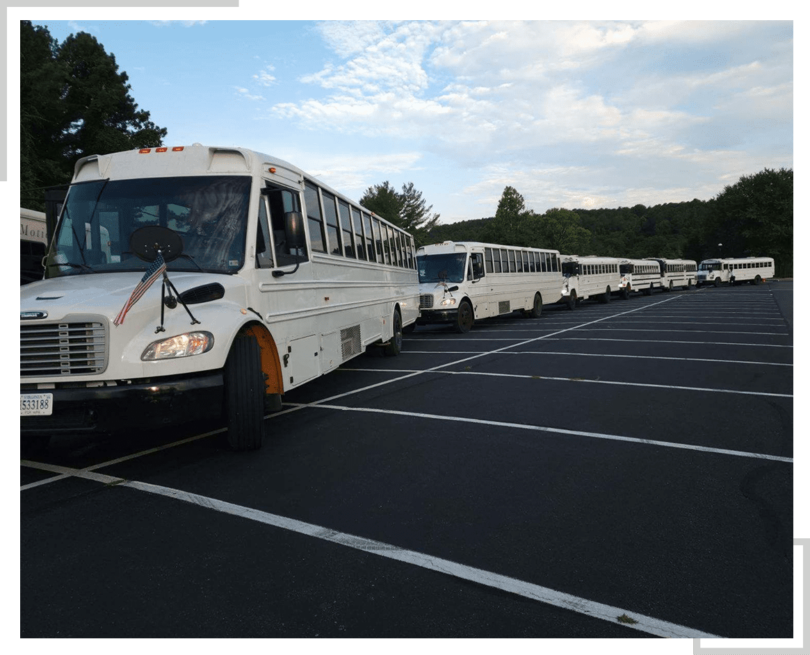 Buses parked in an empty lot